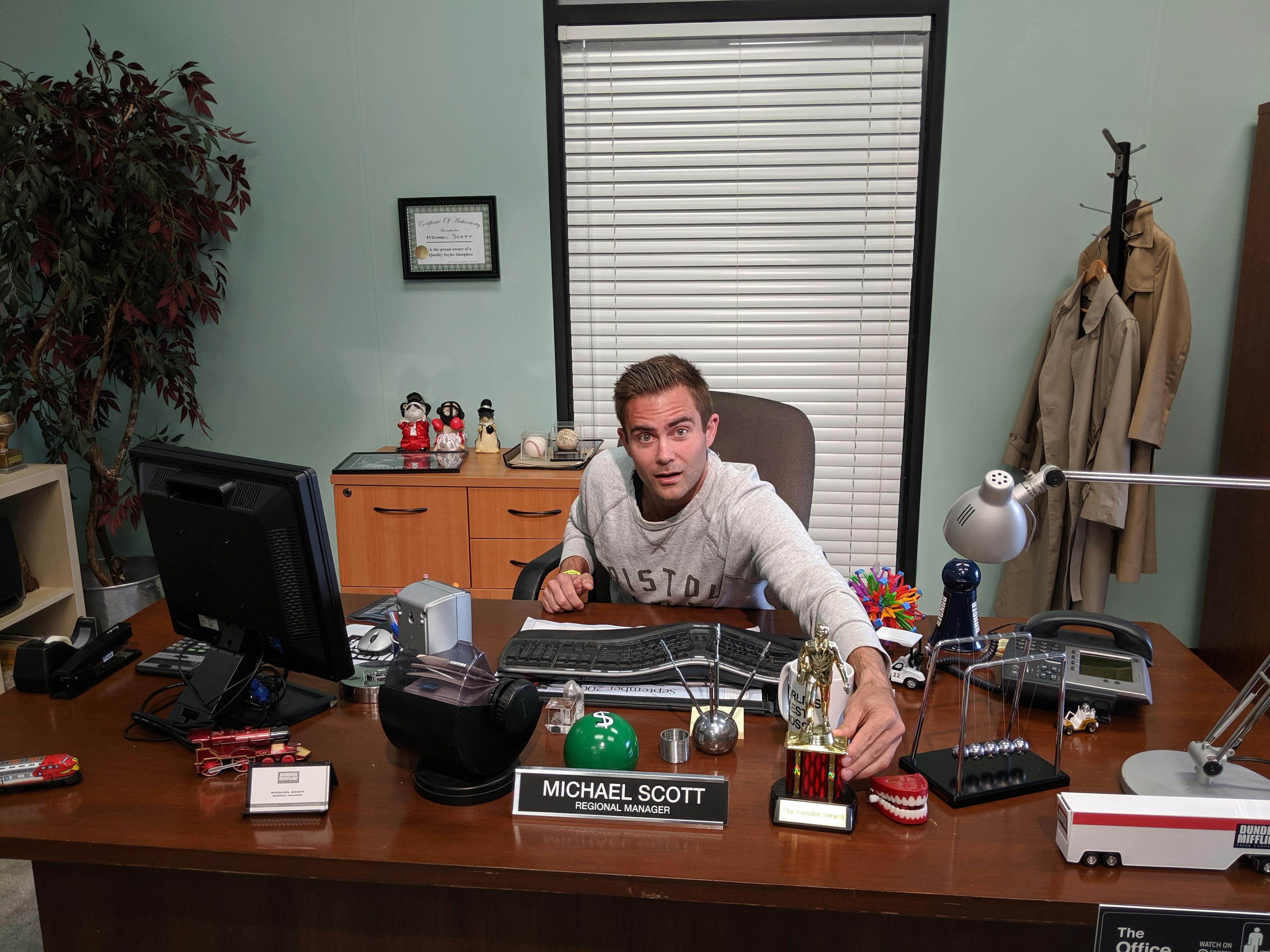 Alex at Michael Scott's desk